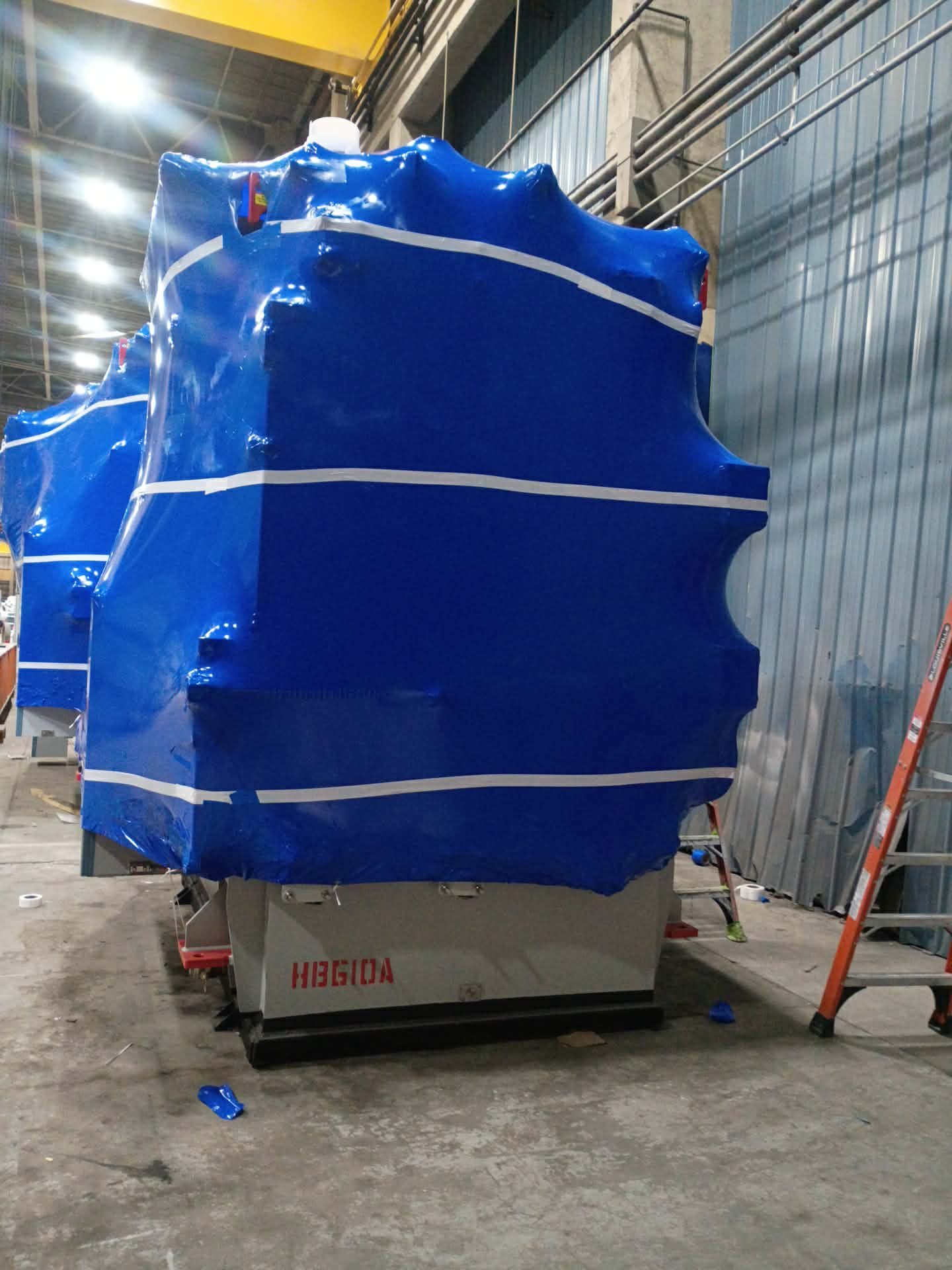 Completed shrink-wrap protection on transformer ready for transport